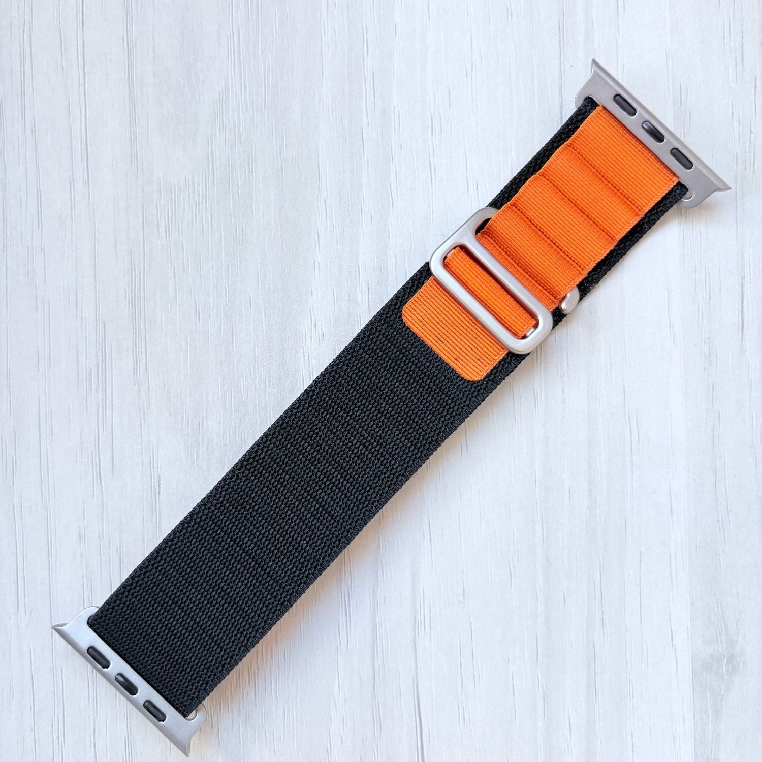 Black Orange Alpine Loop band with silver connectors