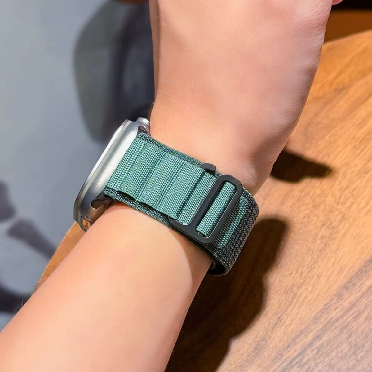 Dark Green Alpine Loop Apple Watch Ultra band on wrist