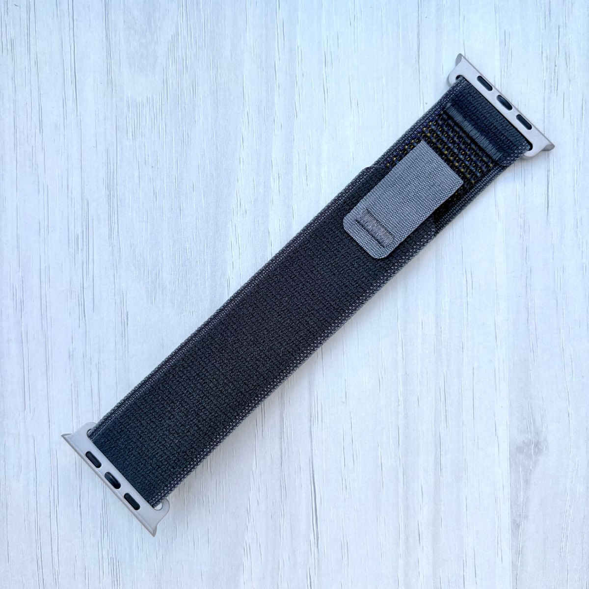 Black Trail loop band with silver finish on a white background