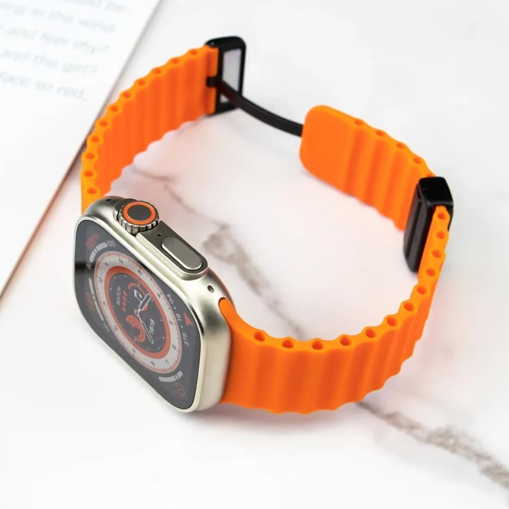 Side view of  orange ocean strap with magnetic buckle linked to apple watch ultra
