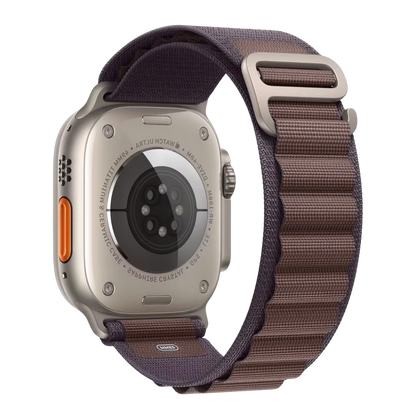 Front view Apple watch Ultra 2 with Indigo Alpine Loop Band and silver buckle on transparent background.