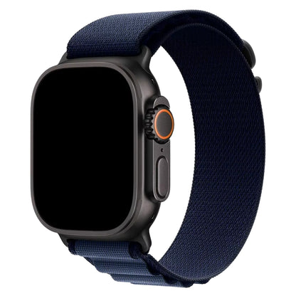 Alpine Loop band in Navy attached to Black Apple Watch Ultra front view