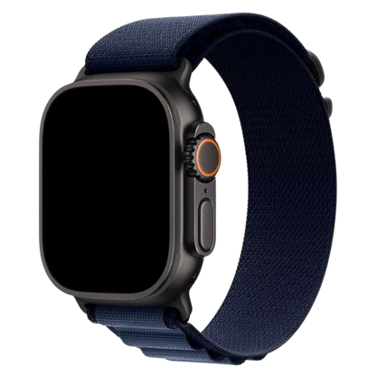 Alpine Loop band in Navy attached to Black Apple Watch Ultra front view