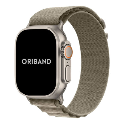 Apple Watch Ultra with a sleek titanium case paired with a Olive Alpine Loop band front view.