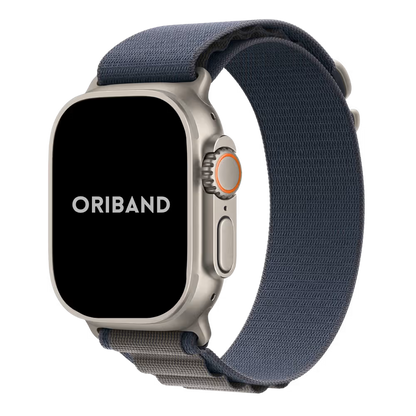 Titanium Apple Watch Ultra with a blue Alpine Loop woven band on a white background, featuring the brand 'Oriband'.