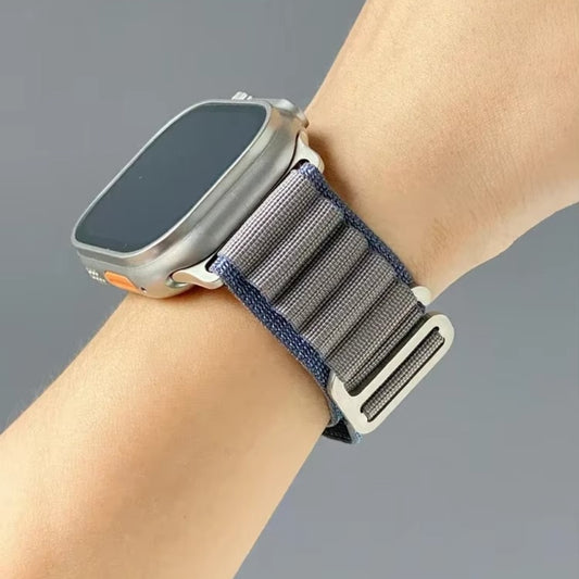 Apple Ultra Watch with Blue Alpine Loop on wrist