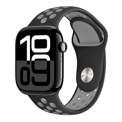 Black Apple Watch series 10 with a black and gray Silicone Nike band on a white background