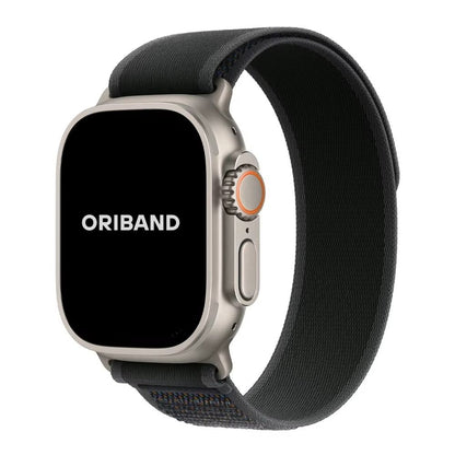 Black Trail Loop Apple Watch band with silver connector – rugged yet lightweight nylon strap built for daily wear and outdoor use.