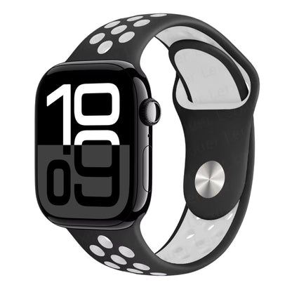 Black Apple Watch series 10 with a black and white Silicone sports Nike band on a white background