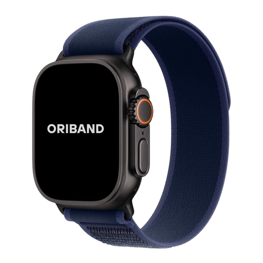 A Blue Trail Loop Band for Apple Watch with a black watch case and a hook-and-loop closure.