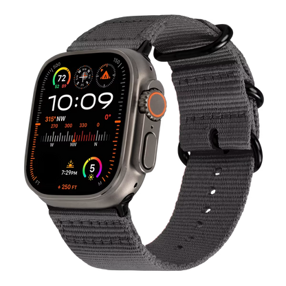 Apple watch ultra with a dark gray Nato strap & black buckle on a transparent background