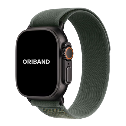 A Green Trail Loop Band for Apple Watch with a full green color scheme, featuring a secure closure and a digital display showing the brand name 'ORIBAND'.