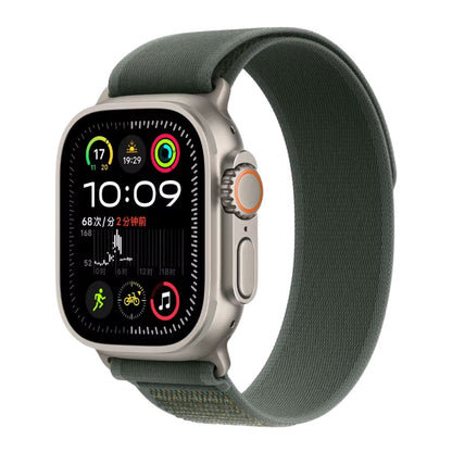 Green Trail Loop Apple Watch band with silver connector – stylish and stretchable band perfect for workouts or casual wear.