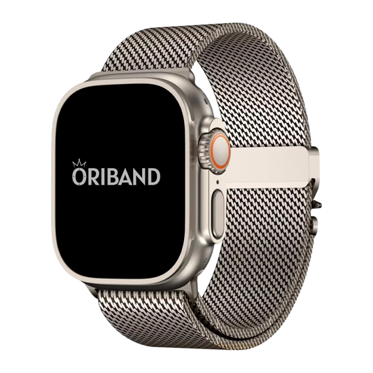 A titanium loop Apple Watch band attached to an Apple Watch Ultra, showcasing a breathable mesh design with a secure clasp.