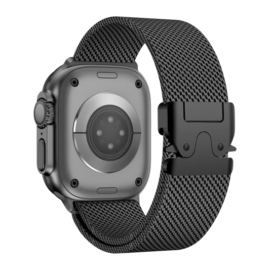 Black Milanese loop stainless steel Apple Watch band attached to an Apple Watch Ultra, featuring a modern design and a secure parachute buckle.