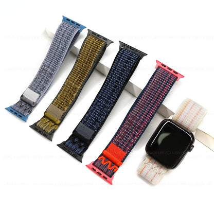 Grey/blue, Black/blue, Green/grey, Starlight/pink and Blue/red nylon sport loop bands for Apple Watch models, showcasing breathable, stretchy design in a variety of vibrant shades.