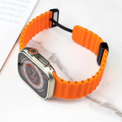 Side view of  orange ocean strap with magnetic buckle linked to apple watch ultra