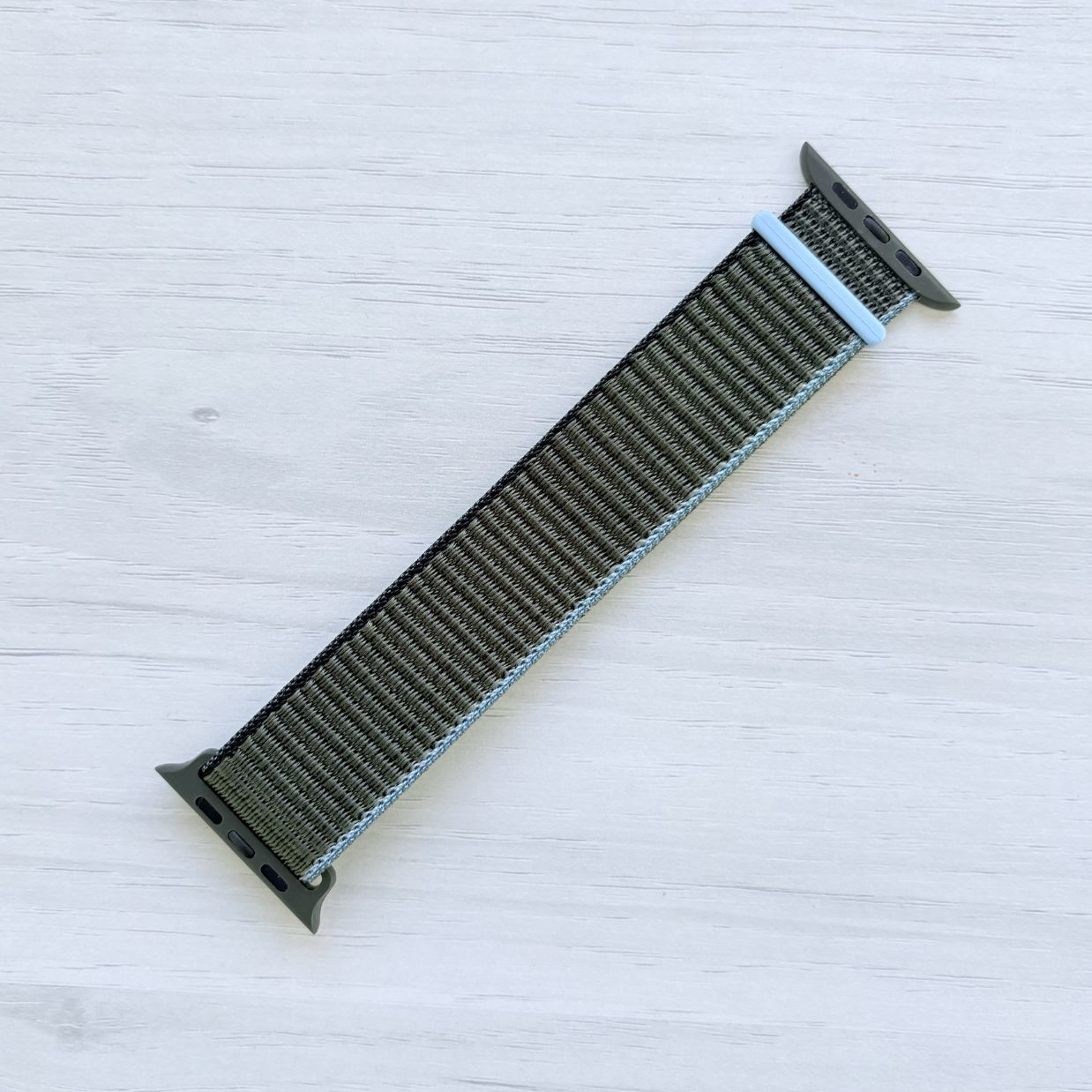 Inverness Green Sport Loop Apple Watch Band with woven nylon design, front view.