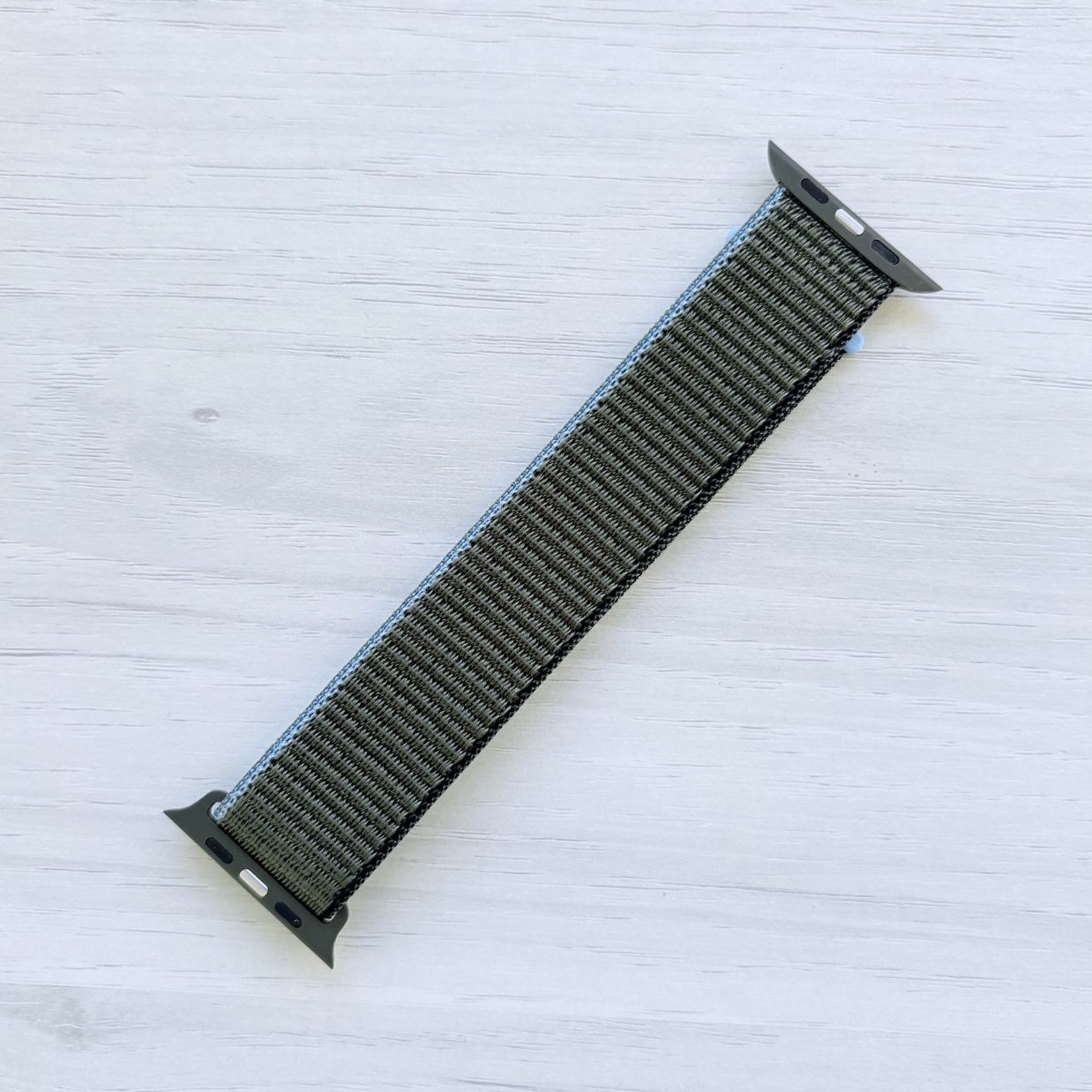 Inverness Green Sport Loop Apple Watch Band with woven nylon design, back view.