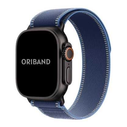 Black Apple watch Ultra 3 with a blue Alpine Loop strap on a white background, featuring the brand 'Oriband'.